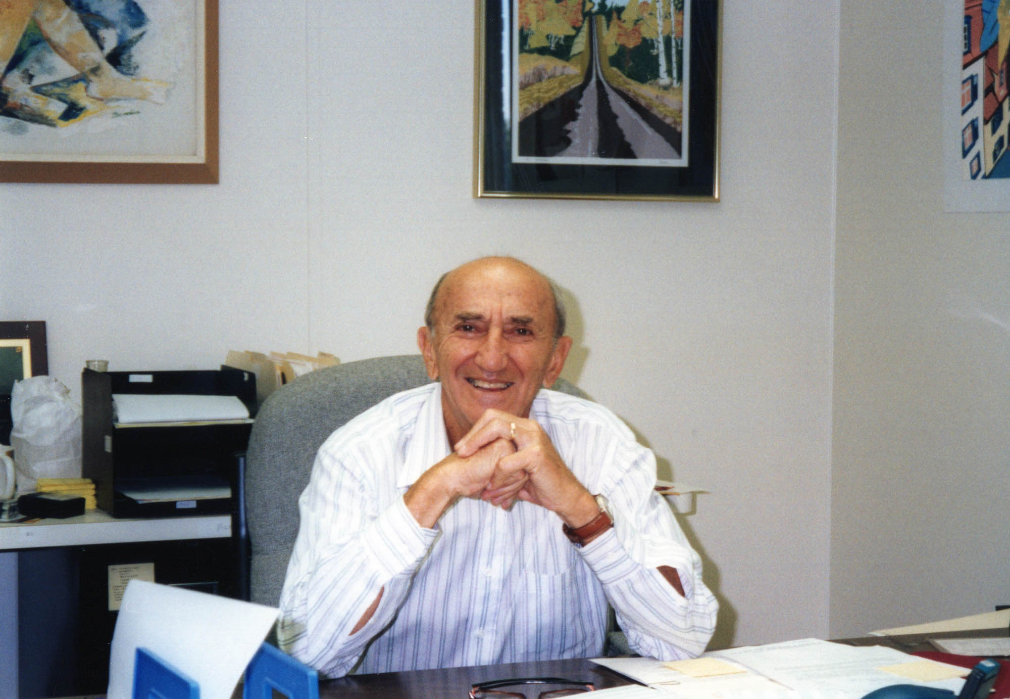 Picture of Marty Cooper in an office smiling.